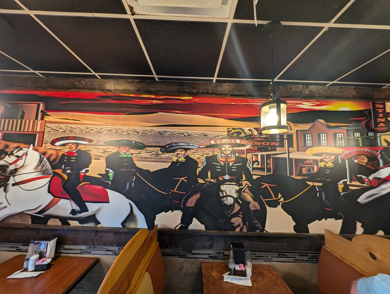 Enchiladas covered in traditional red sauce and cheese